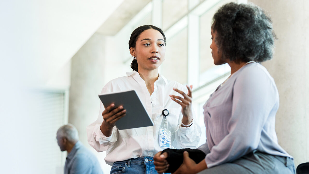 Occupational therapist meeting with a patient